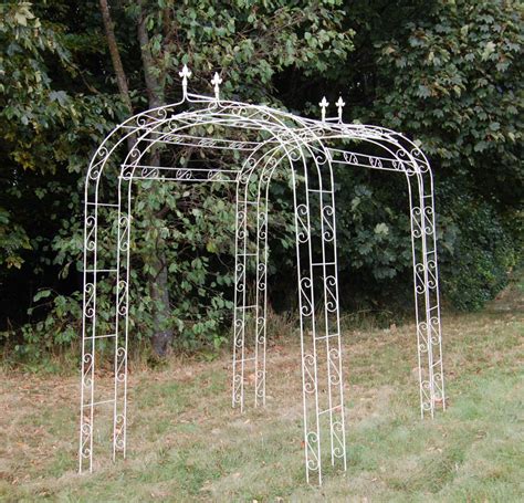 Looks great when a number are positioned through borders or framing paths and views. Cream Metal Garden Arch Tunnel | Garden Ornamnents