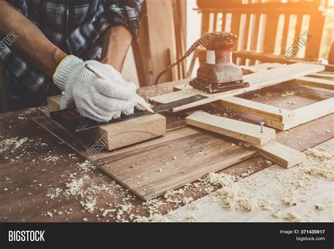 Carpenter Working On Image And Photo Free Trial Bigstock