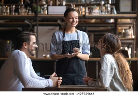 Smiling Waitress Wear Apron Hold Notepad Stock Photo Edit Now 1495964666