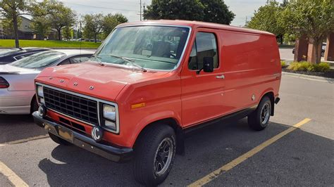 old Ford Econoline vans from before the blue oval was used on the grille : nostalgia