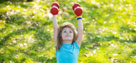 Sport Children Sport Child With Strong Biceps Muscles Kids Exercising