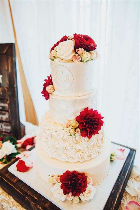 Ivory Buttercream Wedding Cake With Burgundy Flowers