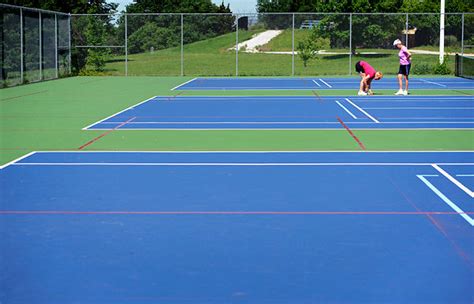 I've never seen two pickleball courts condensed on a tennis court. PHOTO GALLERY: Senior Games volunteers prep pickleball ...