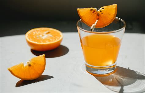 Cut Orange And Glass Of Juice · Free Stock Photo