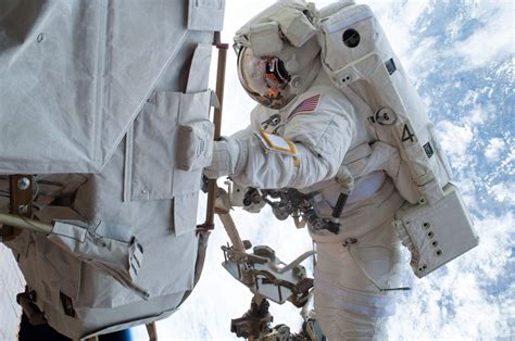 Us Astronauts Conduct Seven Hour Spacewalk Outside Iss