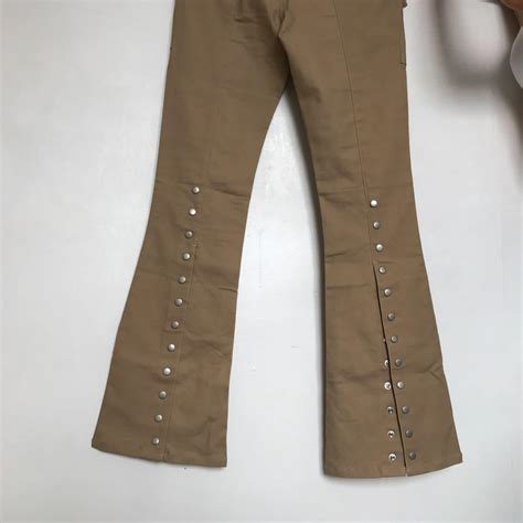 Nude Boot Cut Pants With Extra Buttons In The Lower Part Women S