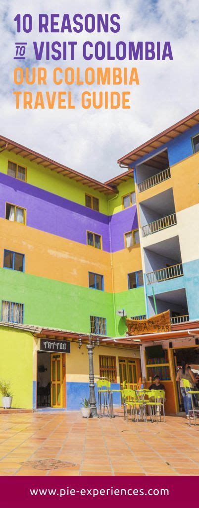 colorful buildings with the words 10 reasons to visit colombia travel guide