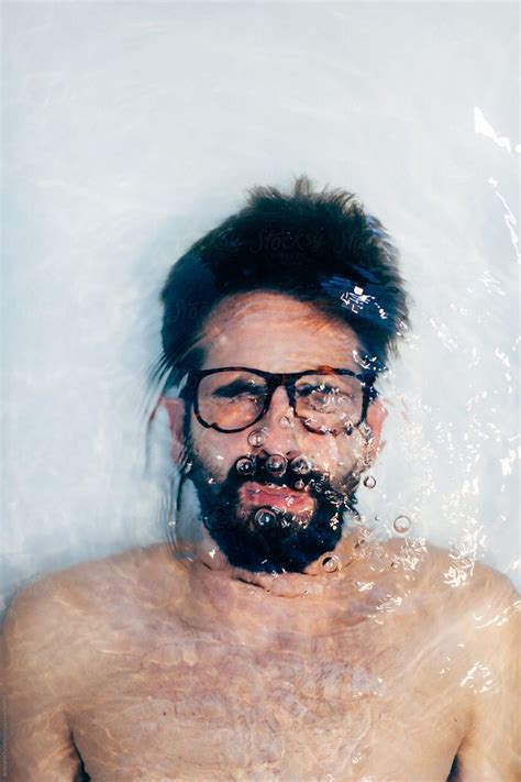 Man Holding Breath Underwater In The Bathtub By Bonninstudio Bathtub