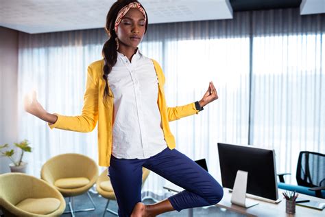 9 Yoga Poses You Can Do At Work