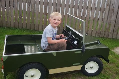 Kirkcudbright Youngster Zipping Around Town On Land Rover Made By His