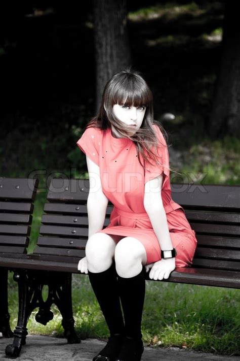 Beauty Glamour Woman Sitting On A Park Stock Image Colourbox