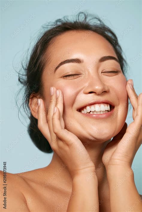 Skin Care Woman With Beauty Face Touching Healthy Facial Skin Portrait Beautiful Smiling Asian