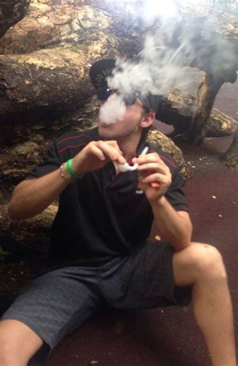 Darwin Teen Posts Photo On Facebook Smoking Bong While Wearing Stolen Police Cap Nt News