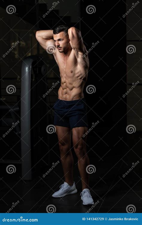 Bodybuilder Flexing Muscles Stock Image Image Of Adult Muscles