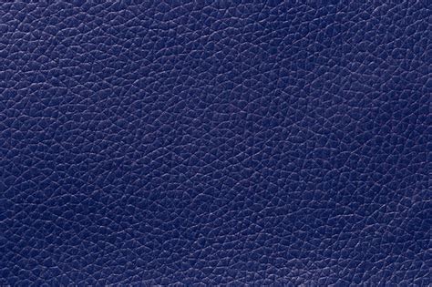 Premium Photo Closeup Of A Dark Blue Leather And Textured Background