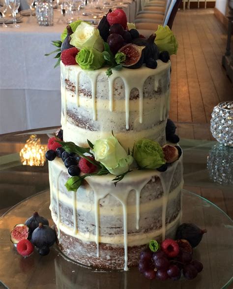 Two Tier Naked Cake With Berries And Roses