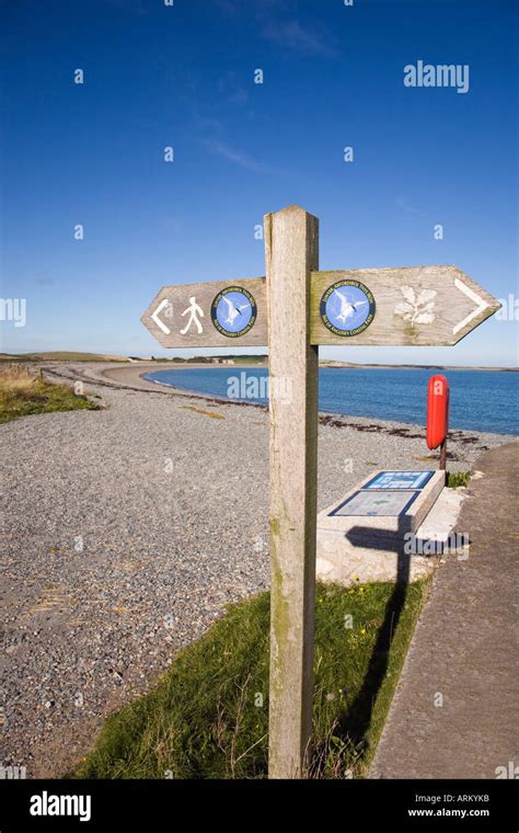 Isle Of Anglesey Coastal Path Sign With Logo Pointing West Along