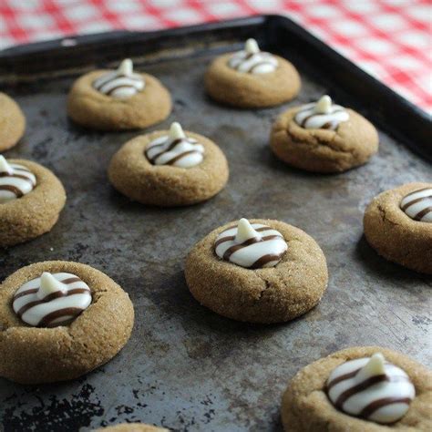 Gingerbread cookie recipes all start the same and mine comes from my mom. White Chocolate Kissed Gingerbread Thumbprint Cookies | Taste And See | Delicious desserts ...