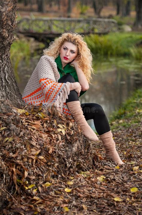 Beautiful Woman Posing In Park During Autumn Season Blonde Girl