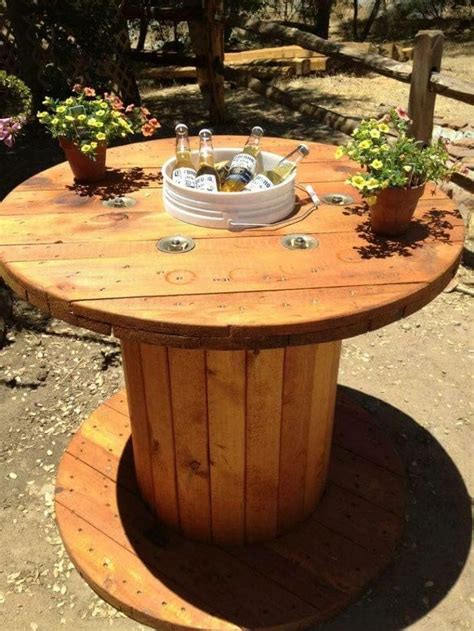 Electric Spool Repurposed Into Table With Ice Bucket Center For Drinks