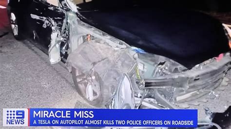 Tesla Driver On Autopilot Crashes Into Police Car Two Officers In The