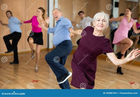 Cheerful Elderly Couple Practicing Ballroom Dances In Ballroom Stock Image Image Of Beautiful