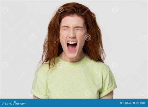 Angry Stressed Redhead Woman Screaming Yelling Loud Isolated On