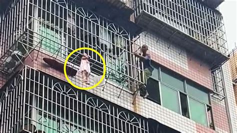 Heroic Neighbors Rescue Girl Dangling From Apartment Balcony