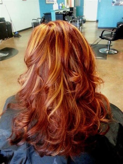 Black hair with highlights is gorgeous and trending strong right now. Red with blonde/copper highlights | Red hair with blonde ...