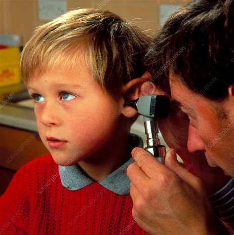Doctor With Otoscope To Check Childs Ear Stock Image M8250361
