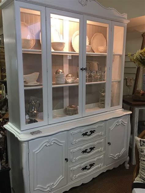 A top mounted light with mirrored back panels illuminates and reflects your displays. China cabinet image by Three Rusty Nails on Buffets and ...