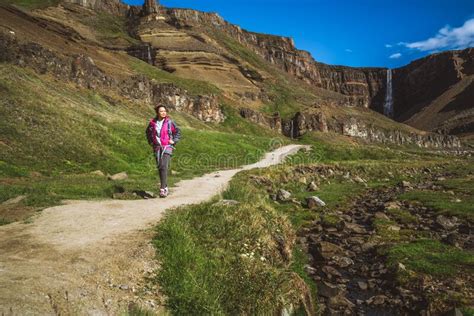 Traveler Hiking At Henoss Waterfall Iceland Editorial Photography