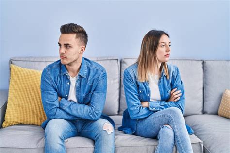 Man And Woman Couple Unhappy Sitting On Sofa At Home Stock Image Image Of Crisis Couple