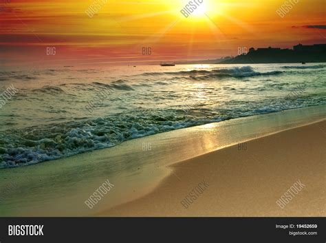 Tranquil Beach Sunset Image And Photo Free Trial Bigstock