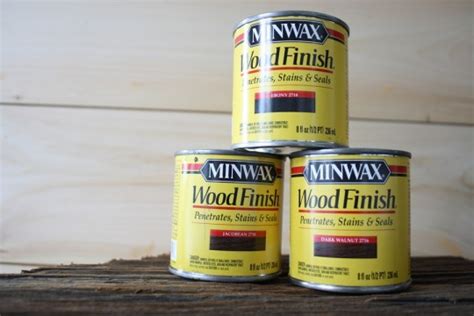 Let the stain soak in for about 30 seconds and then wipe off any excess. Minwax Staining Trials on Shiplap Paneling | merrypad