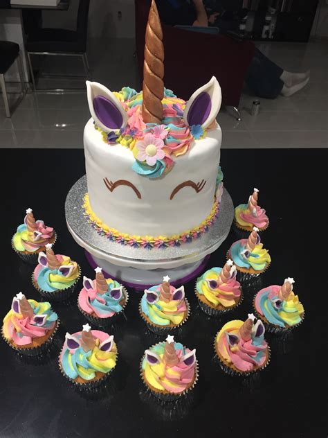 Unicorn Cake With Mini Unicorn Cupcakes With Rainbow Butter Cream And