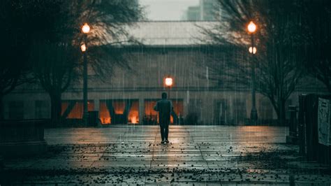 Download Wallpaper 1600x900 Man Rain Loneliness Sad