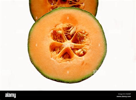 Cut In Half Melon Isolated Over White Stock Photo Alamy