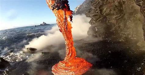 Extremely Close Up Footage Of Lava Spilling Into Water In This Amazing