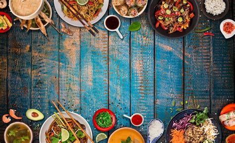 Asian Food Background With Various Ingredients On Rustic Wooden Table
