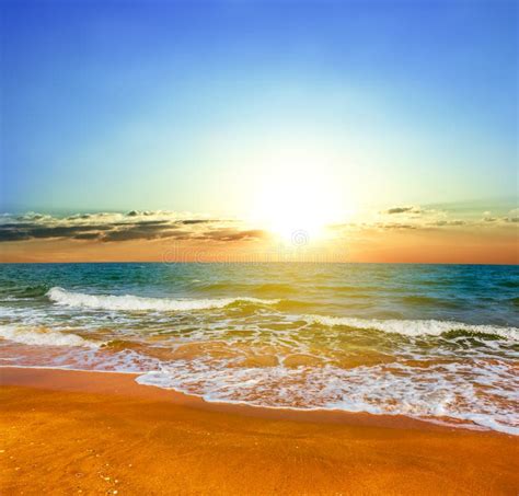Beautiful Summer Sandy Sea Beach Scene At The Sunset Stock Image