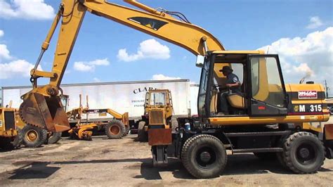 Our list of caterpillar excavators for sale are updated every day. Used Wheel Excavators Cat M315 For Sale - YouTube