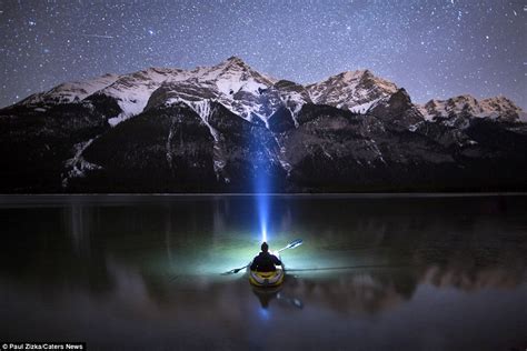 Stunning Photographs Capture A Lone Kayaker In The