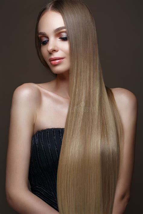 Beautiful Blond Girl With A Perfectly Smooth Hair Classic Make Up