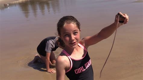 Young Girl Shows How To Catch A Beach Worm For Fishing Bait Youtube