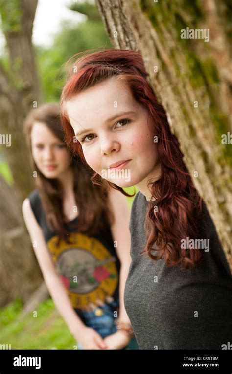 Two Teen Teenage Adolescent Young Girls Together Outdoors