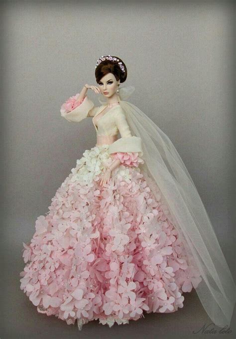 A marital dress, typically all white and decorated with frills and veils. Pin by Forouzan Ameri on Doll | Barbie wedding dress ...