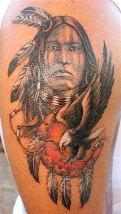 Indian With Amulets And Eagle Tattoo On Half Sleeve Native American