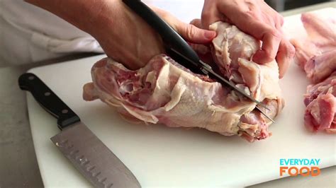 Using a sharp knife, cut the skin between the breast and thigh on one side. How to Cut Up a Chicken | Everyday Food with Sarah Carey ...