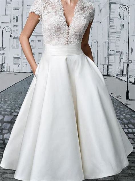 A simple, structured short wedding dress is perfect for a courthouse ceremony. Short Wedding Dresses V-neck Lace Tea-length Ivory Simple ...